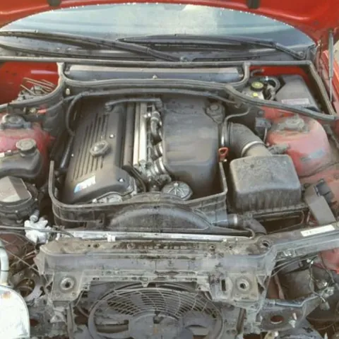 BMW straight-six engine bay with the front slam panel removed